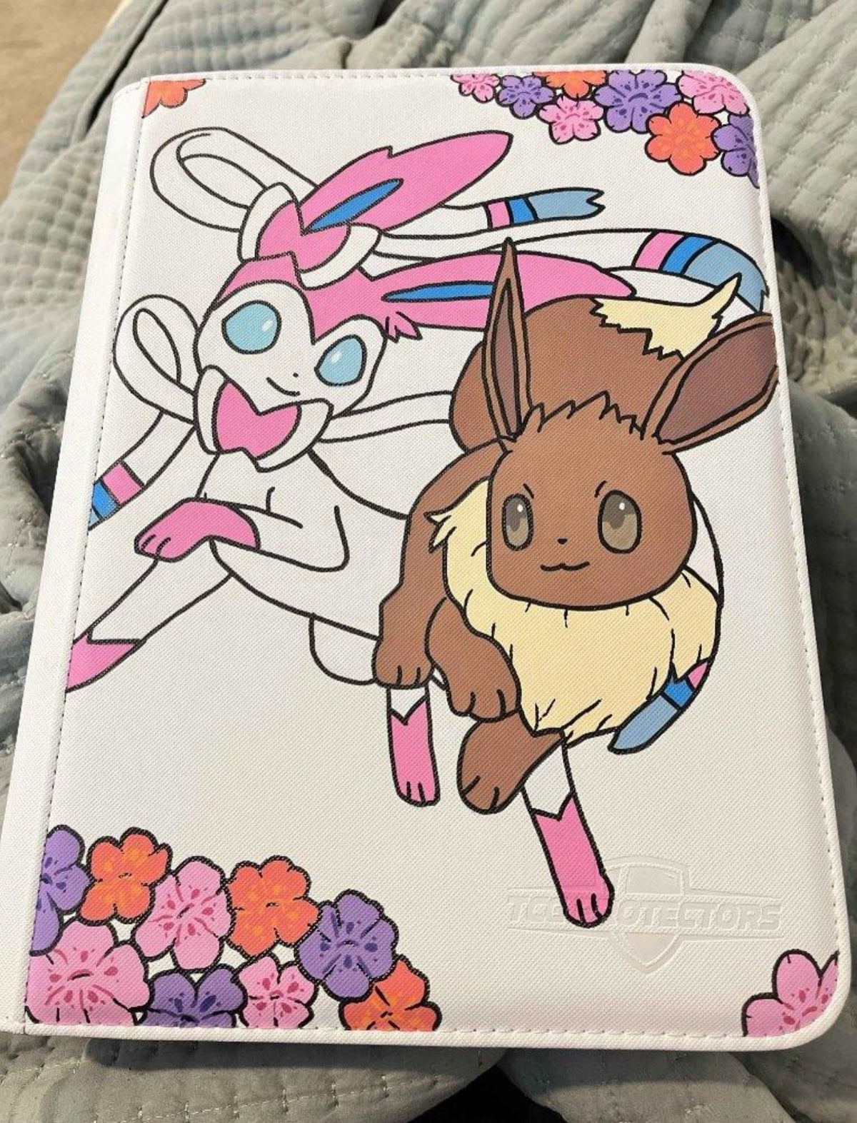 White binder hand-painted with Sylveon and Eevee