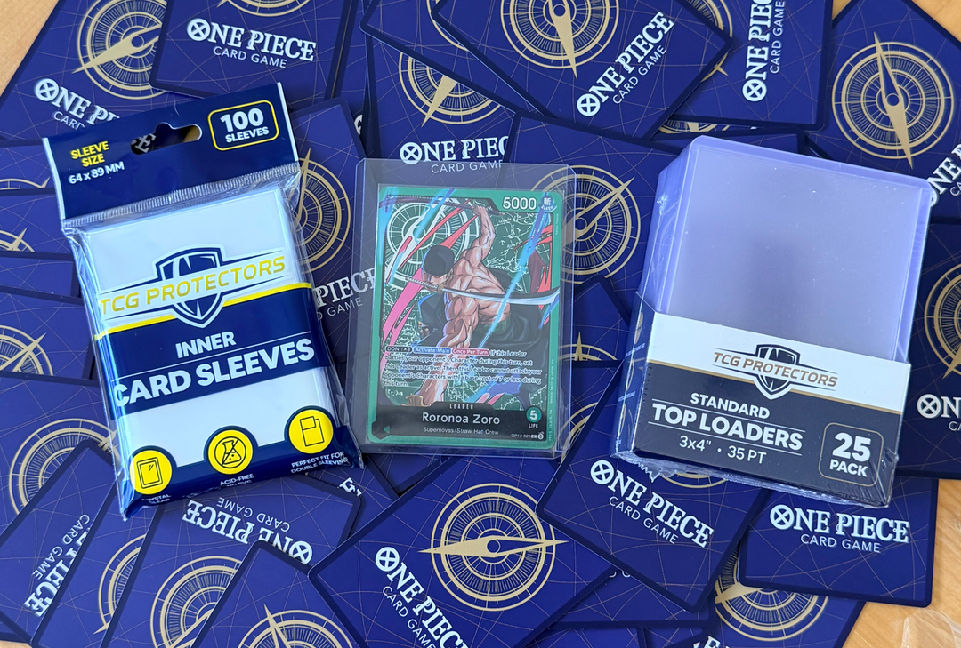 TCG Protectors inner card sleeves and toploaders displayed on a One Piece trading card game playmat.