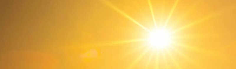 Bright sun shining to represent UV protection for archival TCG display cases.
