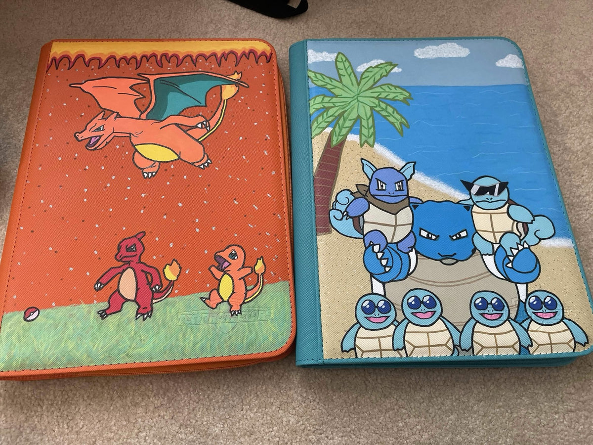 Two hand-painted zip binders with Charizard and Blastoise artwork